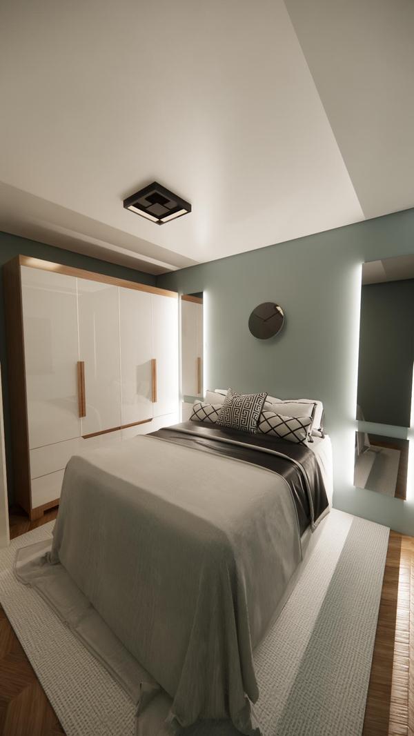 Quarto com cama de casal e guarda-roupa