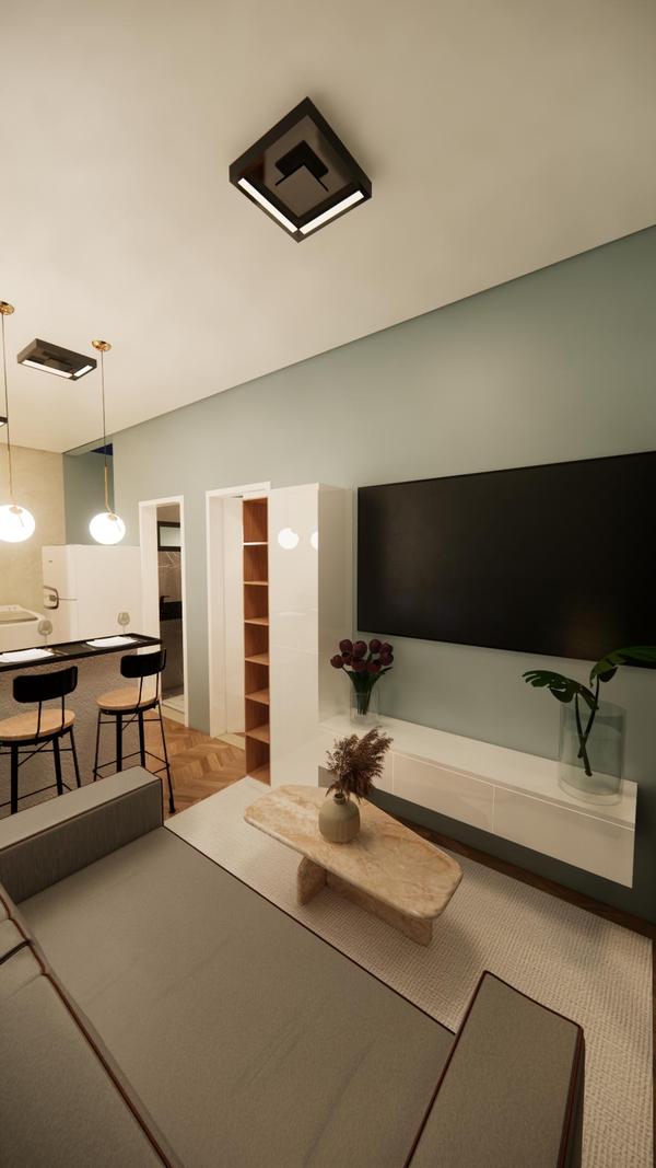 Sala com sofá, TV e porta de vidro